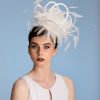white satin loop and feather fascinator hat set on a headband