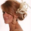 Cream small sinamay and feather fascinator hat