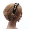 black velvet headband eye shaped jewels