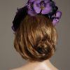 Aubergine sinamay saucer fascinator hatinator hat with purple and black orchid flowers