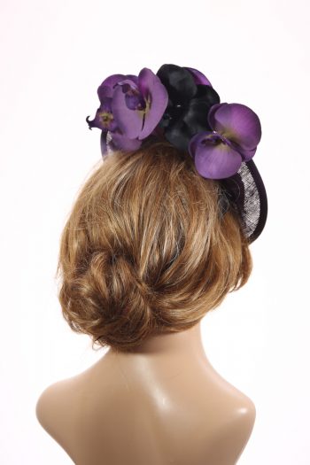 Aubergine sinamay saucer fascinator hatinator hat with purple and black orchid flowers