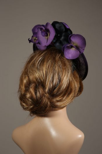 Aubergine sinamay saucer fascinator hatinator hat with purple and black orchid flowers