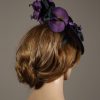 Aubergine sinamay saucer fascinator hatinator hat with purple and black orchid flowers