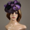 Aubergine sinamay saucer fascinator hatinator hat with purple and black orchid flowers