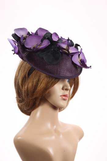 Aubergine sinamay saucer fascinator hatinator hat with purple and black orchid flowers