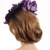 Aubergine sinamay saucer fascinator hatinator hat with purple and black orchid flowers