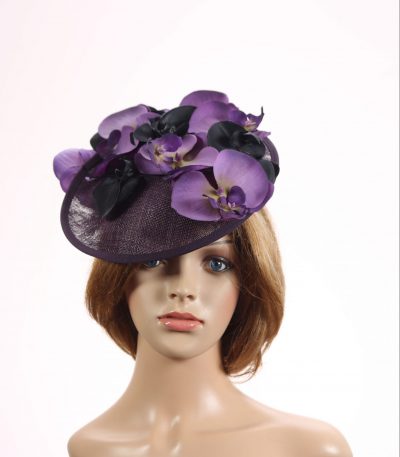 Aubergine sinamay saucer fascinator hatinator hat with purple and black orchid flowers