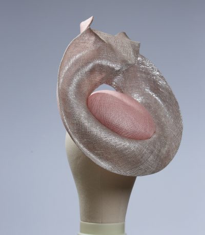 Pale dusky pink button pillbox hat with a silver shimmery lurex saucer
