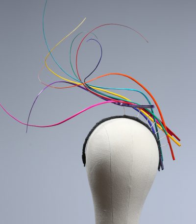 Rainbow multi-coloured quill floating fascinator hat set on a headband