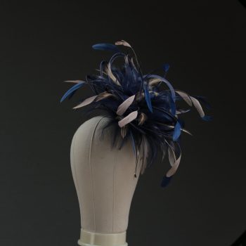 Ladies' formal Navy Blue and Taupe Nude medium feather and satin loop fascinator hat. Suitable for a wedding or ladies' day at the races