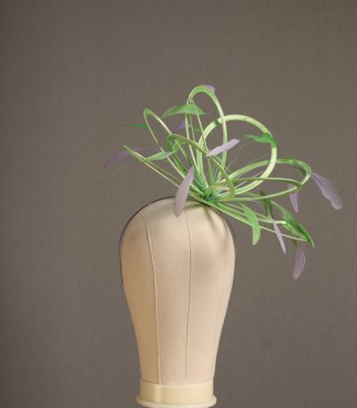 Ladies' formal Apple lime green and Lilac medium feather and satin loop fascinator hat. Suitable for a wedding or ladies' day at the races