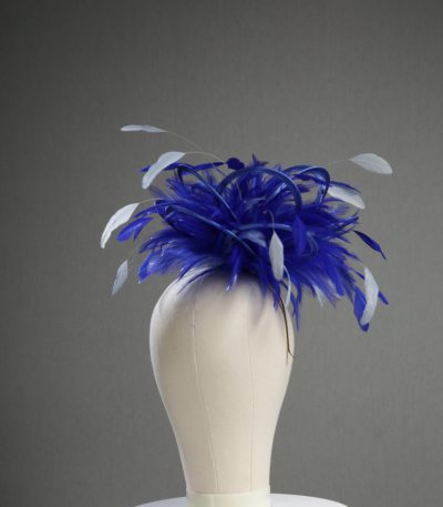 Ladies' formal royal blue and baby blue medium feather and satin loop fascinator hat. Suitable for a wedding or ladies' day at the races