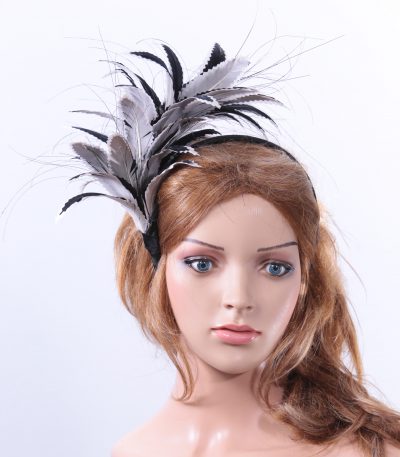 black and pale grey feather mount headband suitable for a wedding or ladies day at the races