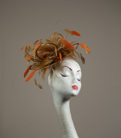 Gold satin Loop Fascinator Hat with gold and orange feathers