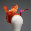 Hot Pink sinamay saucer hat set on a orange button pillbox fascinator