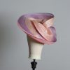 Pink lilac and oyster sinamay swirl fascinator hat set on a teardrop base