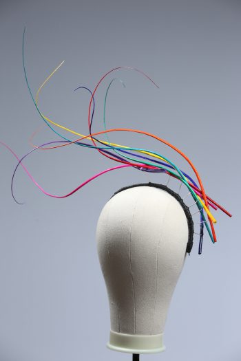 Rainbow multi-coloured quill floating fascinator hat set on a headband