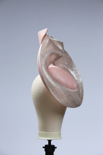 Pale dusky pink button pillbox hat with a silver shimmery lurex saucer