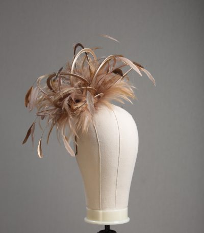 Ladies' formal Taupe Nude and Gold medium feather and satin loop fascinator hat. Suitable for a wedding or ladies' day at the races