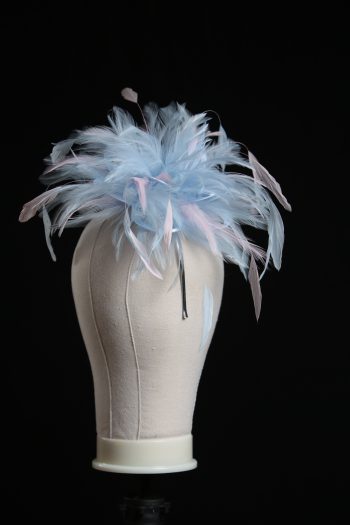 Ladies wedding or races baby blue and baby pink small feather and satin loop fascinator hat