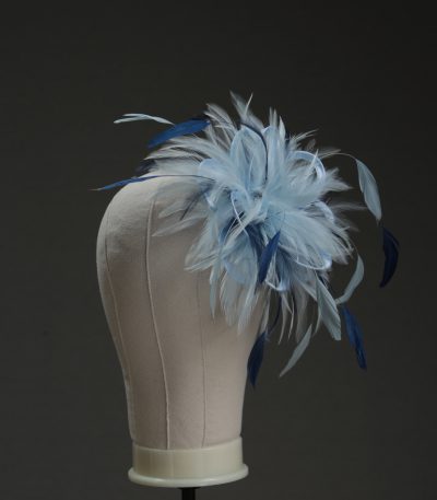 Ladies wedding or races baby blue and navy blue small feather and satin loop fascinator hat